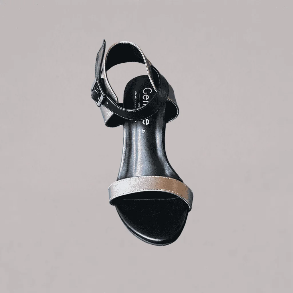 genelle-pewter-ankle-strap-heel-s829 Genelle Pewter Ankle Strap Heel (S/829) shown in a detailed product view. The image highlights the pewter colour and ankle strap heel design.