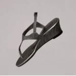 Slingback wedge side profile showing wedge heel shape and handcrafted construction